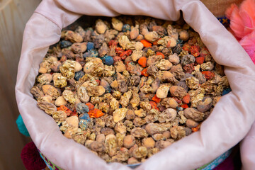 Morrocan local market on the streets with spices, nuts, fish, fruits and vegetables.