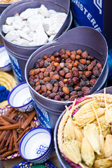Morrocan local market on the streets with spices, nuts, fish, fruits and vegetables.
