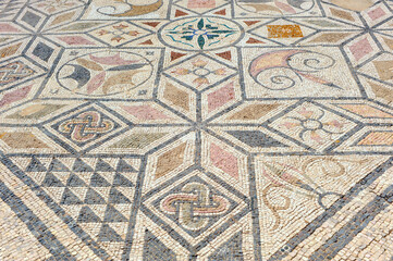 Fototapeta na wymiar Geometric mosaic in Italica, Roman city near Santiponce in the province of Seville, birthplace of Emperor Trajan and origin of the family of Hadrian, Andalusia, Spain