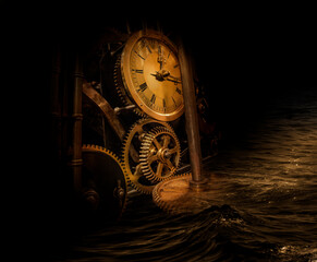 The mechanism of an old antique watch submerged in water. River of time. Philosophy image of time...
