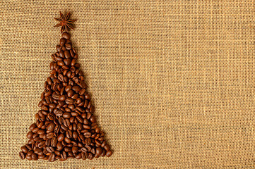 Brown coffee beans on burlap. New year and christmas concept.