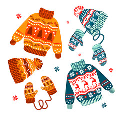 Christmas warm clothes set.Flat cartoon different knitwear.Holiday cute sweaters, hats and mittens with scandinavian patterns.Isolated vector illustration.Prefect for greeting cards,icons,posters.