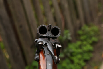 Vintage shotgun in the hand