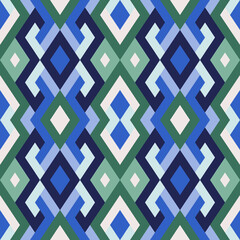 Abstract seamless pattern. Vector geometric background of triangles in green and blue colors. Mosaic texture for textile, clown, carpeting, warp, book cover, clothes