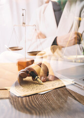 Business and lawyers discussing contract papers with brass scale on desk in office. Law, legal services, advice, justice and law concept picture with film grain effect