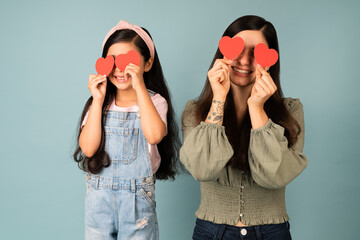 Cute daughter and mom sharing love