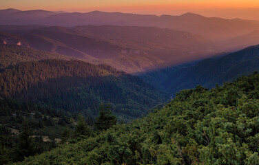 Colorful sunset in the mountains. Amazing landscape. Panorama mountains scenery