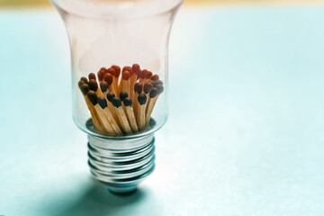 The concept of no electricity. Matches inside a light bulb instead of an incandescent bulb.