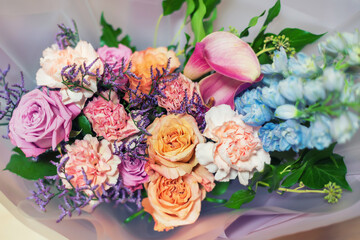 Beautiful bouquet of mixed fresh flowers, background.