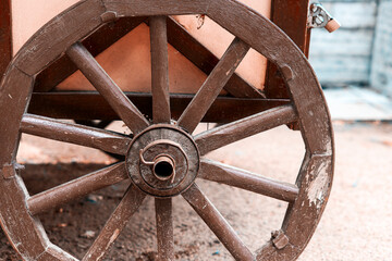 Vintage rustic cart with preservers in glass jars.