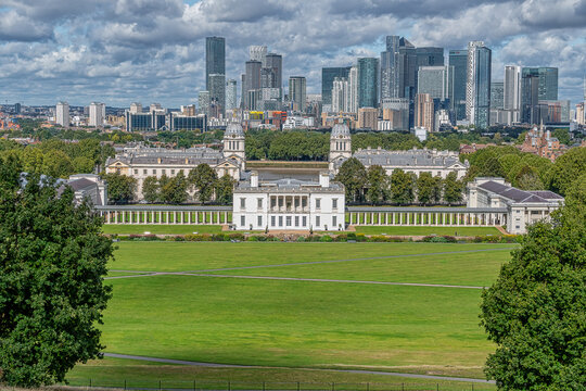 Queens House And Greenwich Maritime Museum With Canary Wharf In The Skyline