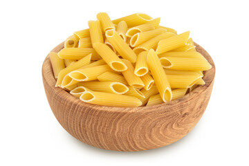 Raw italian penne rigate pasta in wooden bowl isolated on white background with clipping path and full depth of field
