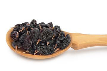 Yellow raisins in wooden spoon isolated on white background with clipping path and full depth of field