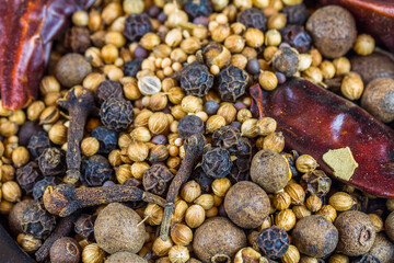 Pickling spices in a bowl, landscape close up texture, background.