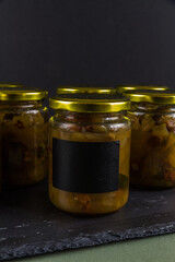 Batch of home made marrow chutney jars, portrait copyspace label to fill.
