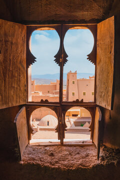 Old city view trough a window.