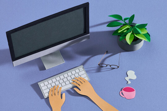Female hands working on modern pc.