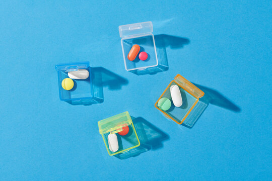 Close up of pills with medicine box