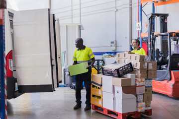 Volunteer preparing the van for distribute