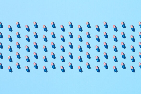 Colorful pink blue capsules pattern