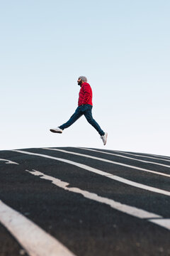 Man jumping in the street