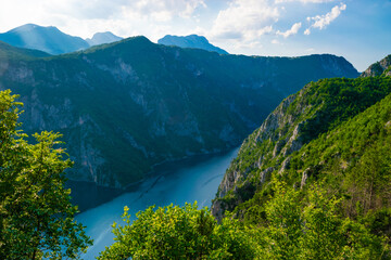 Canyon of Piva River and Lake located between high mountain ranges near Pluzine. Montenegro. Balkans.