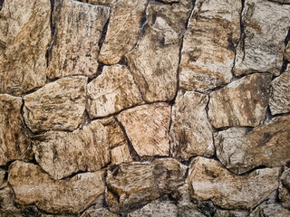 Wall with vibrant hot colored stone background