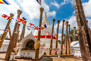 The white Thuparama dagoba with a red ribbon, Anuradhapura, Sri Lanka, Asia
