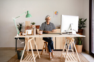 Woman preparing an order at workplace
