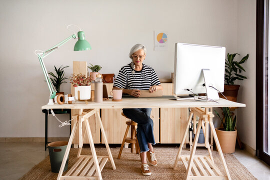 Woman preparing an order at workplace