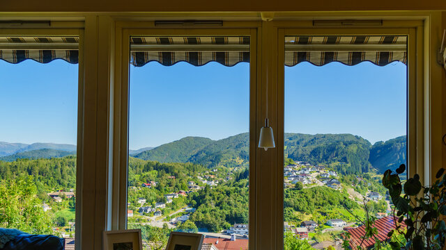 House window with norwegian landscape