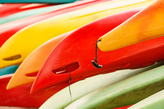 Kayaks in stack outdoors