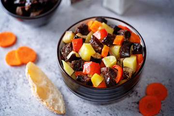 Beef potato carrot eggplant pepper stew in the bowl