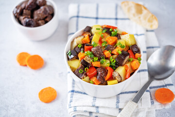 Beef potato carrot eggplant pepper stew in the bowl