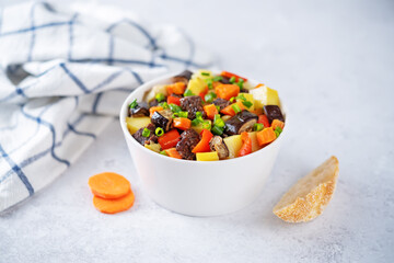 Beef potato carrot eggplant pepper stew in the bowl