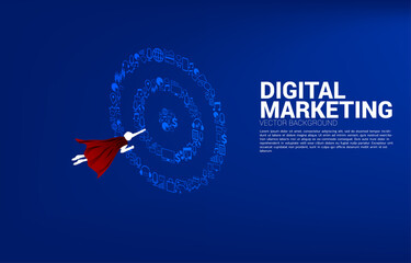 Silhouette of superhero flying fast to dartboard from icon. Concept of boost and growth in business. © Panithan