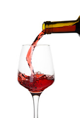 Pouring of sweet red wine into glass on white background