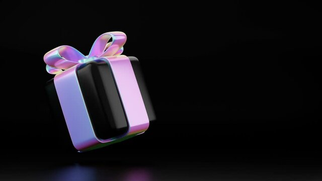 rotating gift box animation with holographic ribbon flying and rotating in studio. Christmas, black friday, birthday 3d gift animation. 4k seamless loop motion video greeting card on black background.