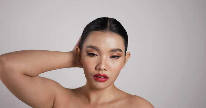 Close up of Beauty Asian woman face looking at camera