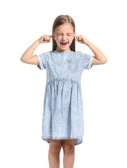 Cute little girl in striped dress covering ears on white background