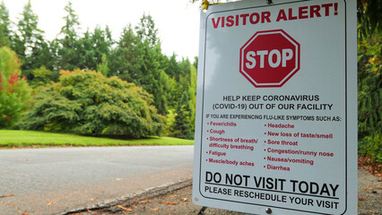 cover- 19  sign in the park