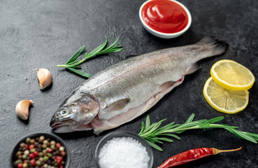 raw trout on a stone background