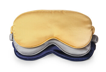 Different soft sleep masks on white background