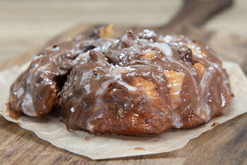 Glazed nutella roll served as a sweet pastry for breakfast
