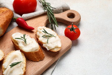 Pieces of bread with lard spread on white background