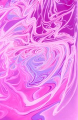 Abstract background of pink marble. Acrylic paint mixes freely and creates an interesting pattern. Bright saturated shades. Background for the cover of a laptop, laptop.