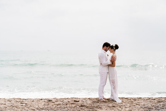 In love embrace by the sea