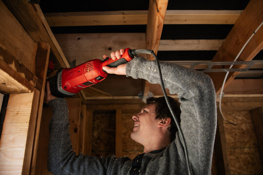 Young tradesman plumber working