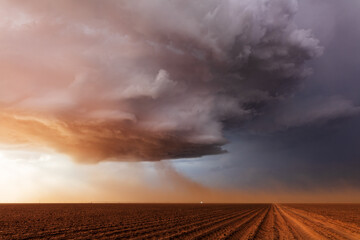 Supercell thunderstorm with dramatic storm clouds and blowing dust