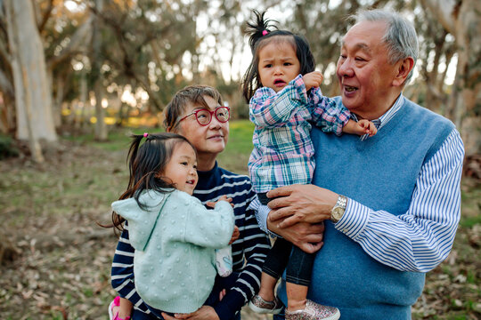 Grandparents outdoors with granddaughters 